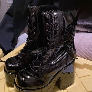 Demonia Platform Thigh High Boots in a size 10